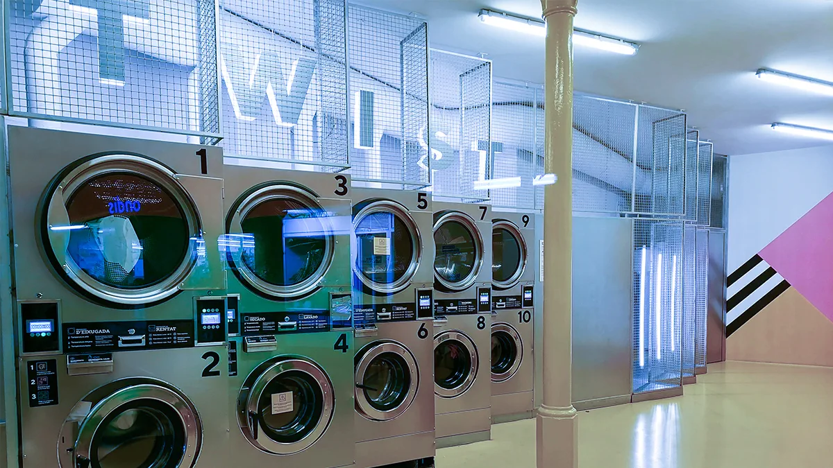 Industrial vaportight LED lighting fixture in a food processing facility with washdown-rated housing
